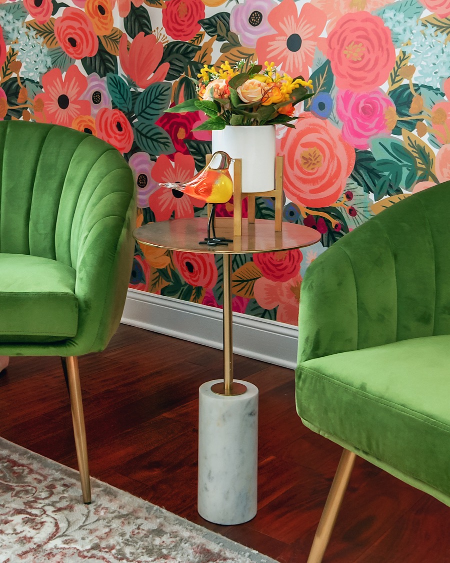 A marble and glass table with a vase of flowers on it. Intricate details are the hallmark of a truly unique and fascinating biophilic space.