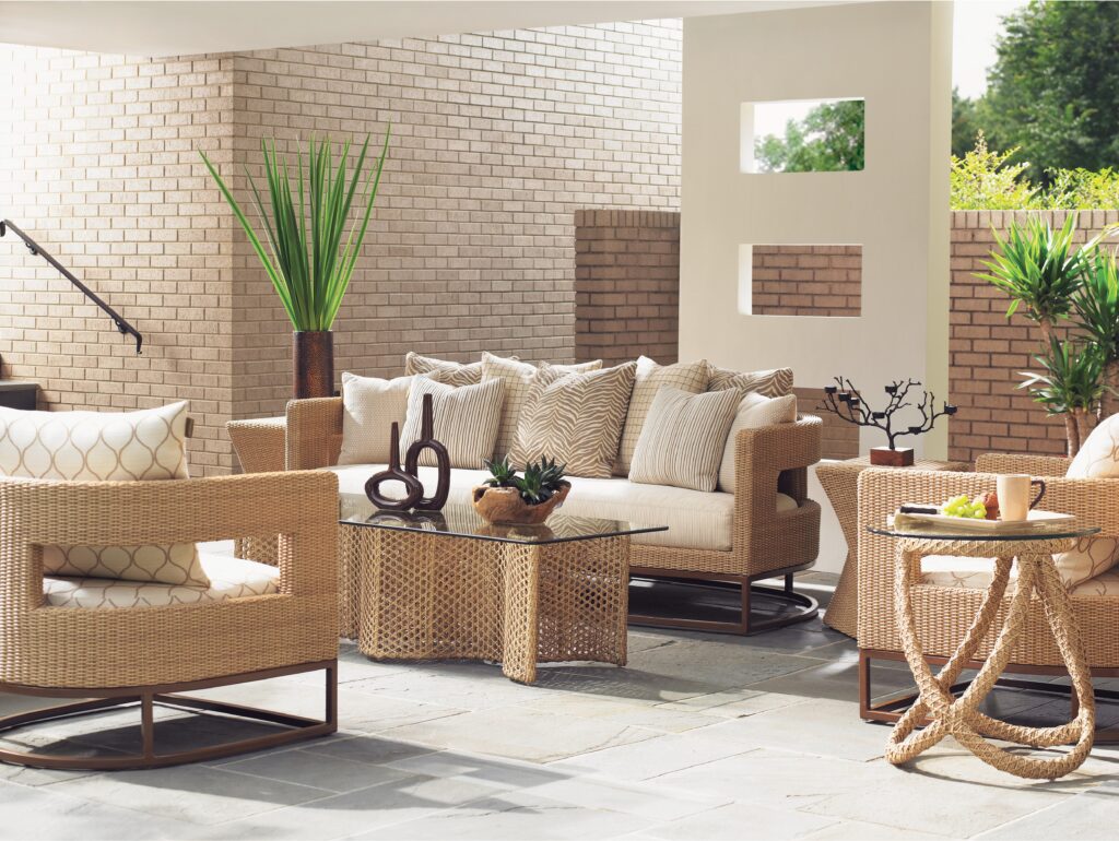 A patio with a couch and a table.

