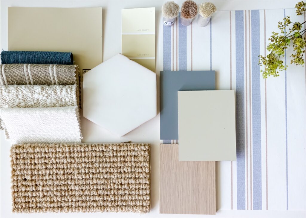 A group of different textures and colors of carpet, fabric, and tile.